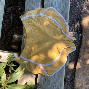 Mini yellow tennis shorts